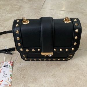 Women bags,New with tags,color black.